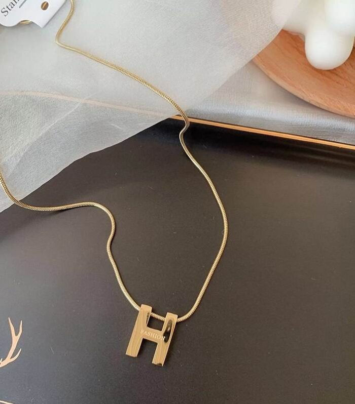 Golden ‘H’ pendant necklace